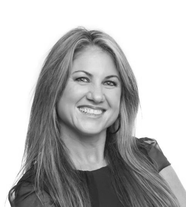 black and white headshot of Melanie Beirne, facilitator of the Aspire Women's Leadership Development Programme. White background.